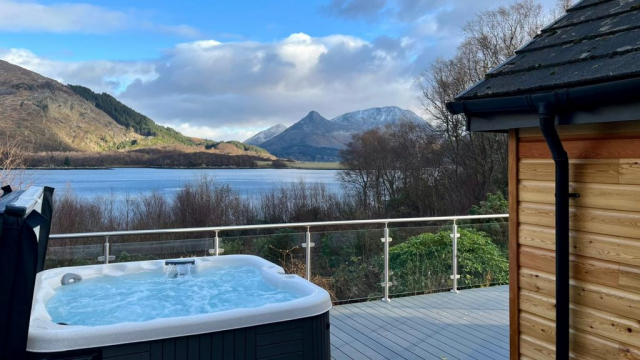 Relax in your private hot tub overlooking Loch Leven down to Glencoe